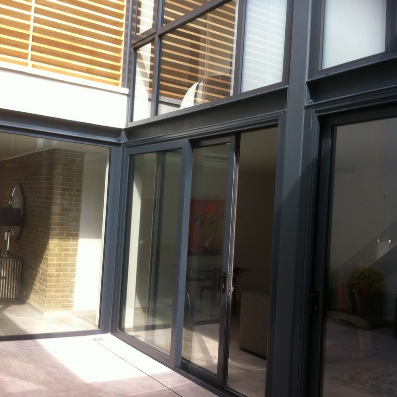 Anthracite aluminium sliding patio doors fitted in Finchley Central