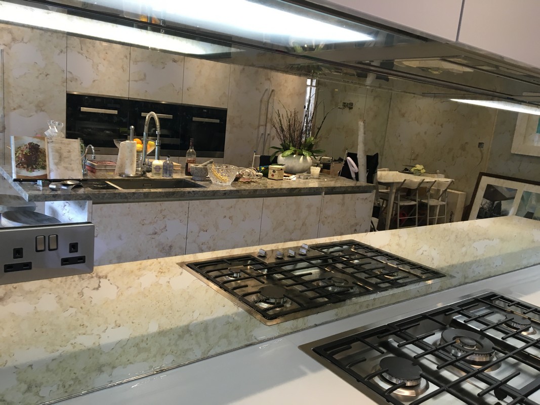 Mirror glass splashback in Finchley Central luxury kitchen